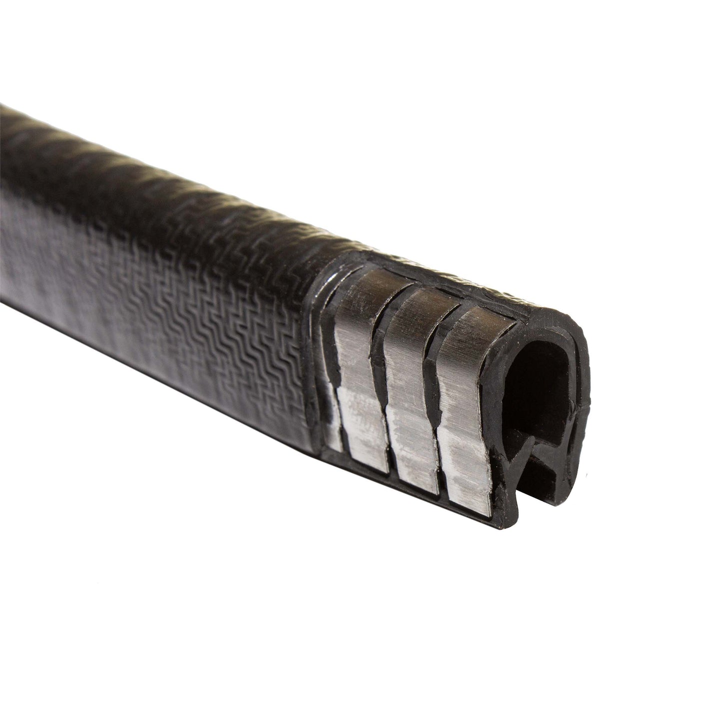 closeup image of the HDPE guard that contains evenly spaces metal clips that is used to create a more finished appearance on landscape edging. 