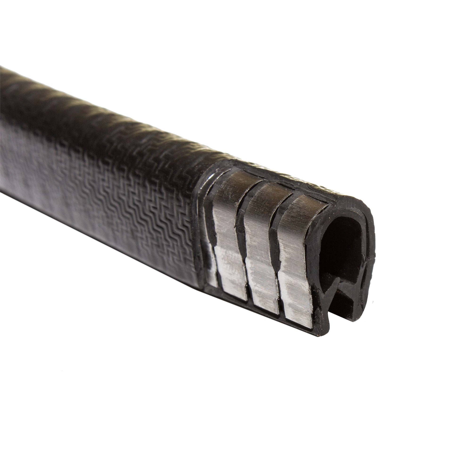 closeup image of the HDPE guard that contains evenly spaces metal clips that is used to create a more finished appearance on landscape edging. 